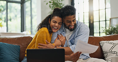 Buy stock photo Happy, hug and couple with paperwork, financial planning or excited for home loan on website or app. Laughing, man and woman with document for mortgage, laptop and celebration with embrace in house
