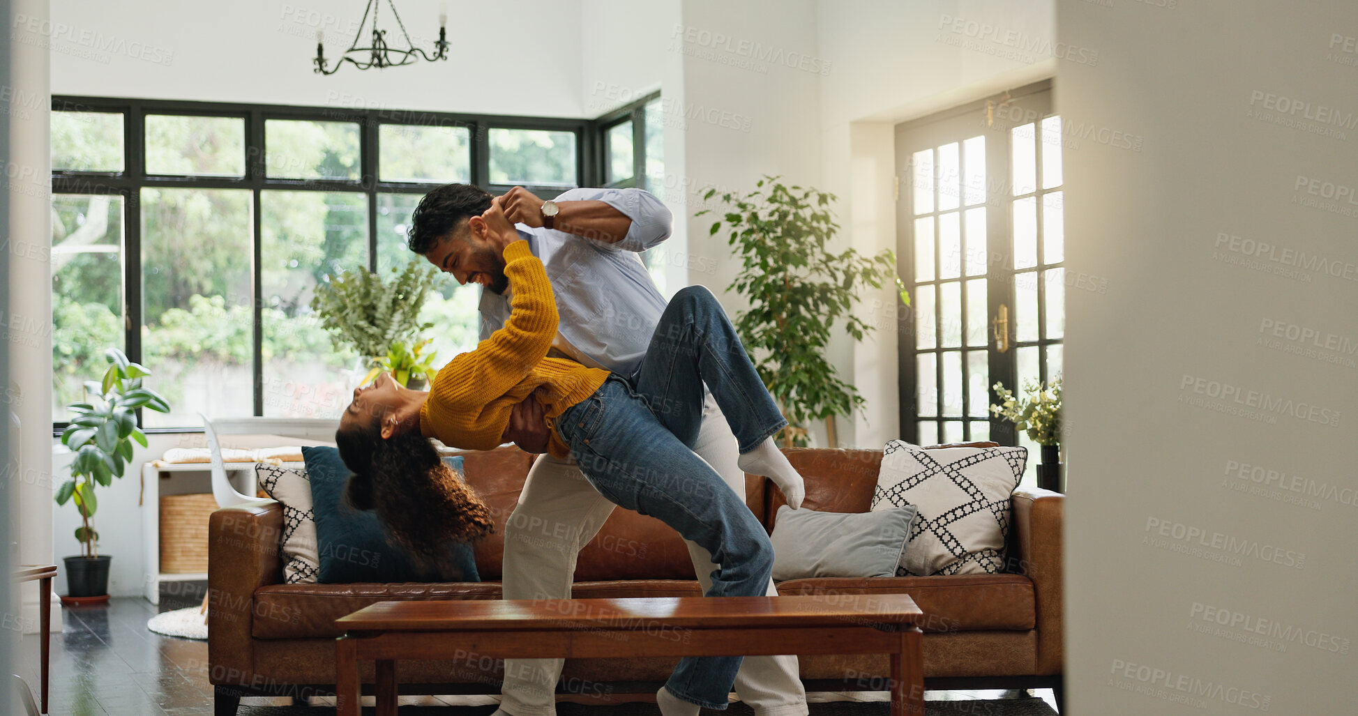Buy stock photo Home, dancing and couple in lounge, love and bonding together with romance, smile and relationship. Apartment, movement and man with woman, marriage and happiness with music, energy and celebration