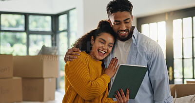 Buy stock photo Tablet, reading and moving with couple in new home for property, support or mortgage success. Real estate investment, celebration or loan approval with man and woman in living room for house purchase