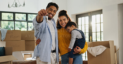 Buy stock photo Keys, smile and portrait of family in new home for moving, property investment and security. Happiness, mortgage approval and real estate with parents and child in living room of house for rent