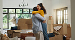 Hug, success and moving with couple in new home for property, support and mortgage success. Real estate investment, celebration and relocation with man and woman in living room for house purchase