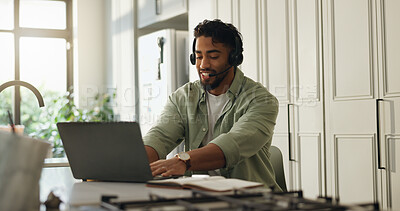 Buy stock photo Man, headset and laptop in kitchen for remote work, typing and advice for customer care call center. Technology, freelance help desk and consultant or virtual assistant for telecom support in home