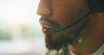 Closeup, call centre and man with headset, business and help desk with telemarketing. Mouth, person and consultant with conversation, advice and communication with friendly service and crm support