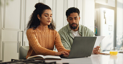 Buy stock photo Laptop, documents and typing with couple in kitchen for bills, home loan and financial planning. Online banking, paperwork and budget review with man and woman reading in house for application