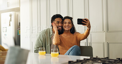 Buy stock photo Happy, couple and selfie in kitchen, love or bonding with affection in home, online or social media. People, smile and profile picture for post on website, commitment and romance for photography