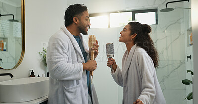 Buy stock photo Couple, dance and singing in bathroom with love, energy and excited with morning routine. Brush, man and woman in home with music for celebration, karaoke rhythm and bonding with partner for romance