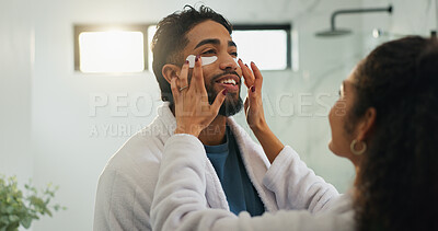Buy stock photo Skincare, eye patches and love with couple in bathroom for beauty, morning routine and diy spa. Facial treatment, self care and cosmetics with man and woman in home for collagen, dermatology and glow