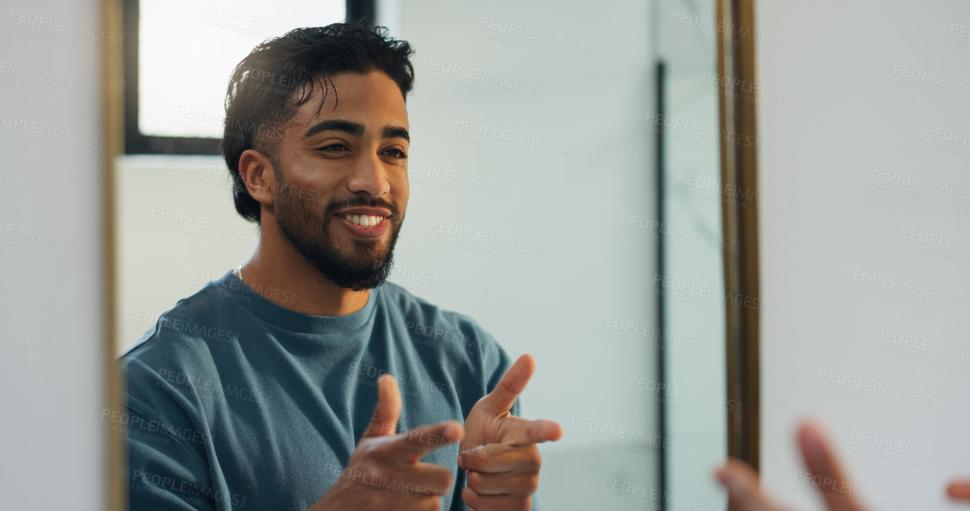 Buy stock photo Finger guns, mirror and man in bathroom with confidence for skincare, grooming and health in home. Happy, reflection and person with shooting gesture for hygiene, wellness and morning routine