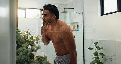 Buy stock photo Bathroom, grooming and man with beard, house and inspection of fresh shave, self care and shirtless. Checking, reflection and maintenance of facial hair in home, person and getting ready with mirror