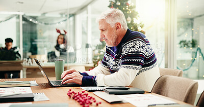 Buy stock photo Christmas, business and man with laptop, thinking or problem solving with investment. Mature person, financial agency or employee with PC, Xmas or internet with research for economy report or festive
