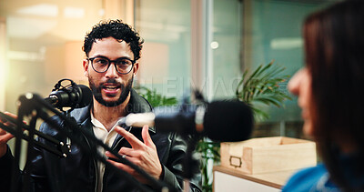 Buy stock photo Podcast, studio and people with mic talking for radio show, interview and broadcast subscription. Influencer, content creation and man with woman for recording, conversation and host on live stream