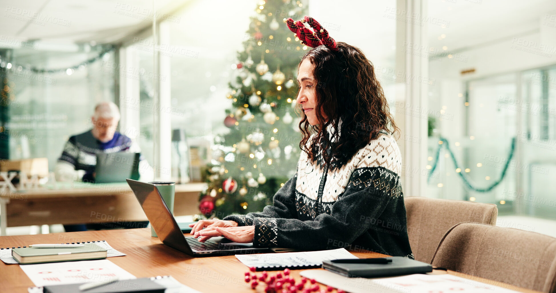 Buy stock photo Christmas, office and business woman on laptop for finance report, proposal and finish project for holiday. December, corporate and person on computer for year end payroll, financial review or budget