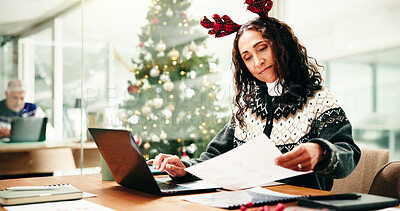 Buy stock photo Christmas, business and woman with documents, laptop and deadline for budget report. Xmas, person and employee with paperwork, festive and payment schedule with finance agency, revenue or checklist