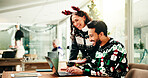 Laptop, christmas and businessman with manager in office for review on finance proposal. Computer, xmas and male financial advisor with mentor for feedback on investment report in festive season.