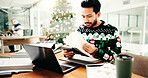 Christmas, business and man in office, notebook and deadline for annual profit audit. Xmas, person and employee with paperwork, festive and budget report with finance agency, revenue or checklist