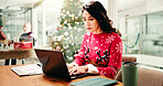 Christmas, office and business woman on computer for finance report, proposal and profit for holiday season. December, corporate and person on laptop for payroll bonus, financial review and budget