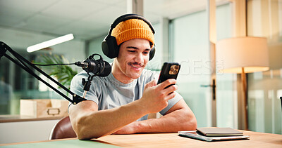 Buy stock photo Online, influencer and man with smartphone, podcast or reading comments on social media or creative. Happy, podcaster and person with mobile app for reviews, content creation and followers on website