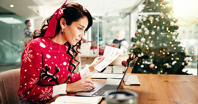 Buy stock photo Christmas, laptop and woman in workplace, documents and deadline for economy report. Xmas, person and employee with paperwork, festive and investment results with finance agency, comparison or email