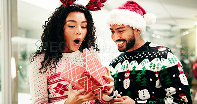 Buy stock photo Christmas, surprise and business people with box in office for holiday gift, tradition or celebration. Professional, friends and man giving present to woman for festive season, xmas party and excited