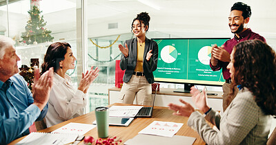 Buy stock photo Christmas, colleagues and applause in boardroom, happy and celebration for sales, graphs and report. Team, meeting and people with chart for financial growth, clapping or holiday success for business