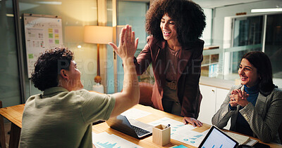 Buy stock photo Business, people and high five in office at night of good news, celebration and finance growth. Employees, laptop and success for teamwork, profit increase and deadline achievement of investment deal