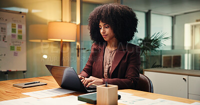 Buy stock photo Accounting, laptop and night with business woman in office for finance, investment or report deadline. Computer, evening and financial review with African employee at desk in workplace for planning