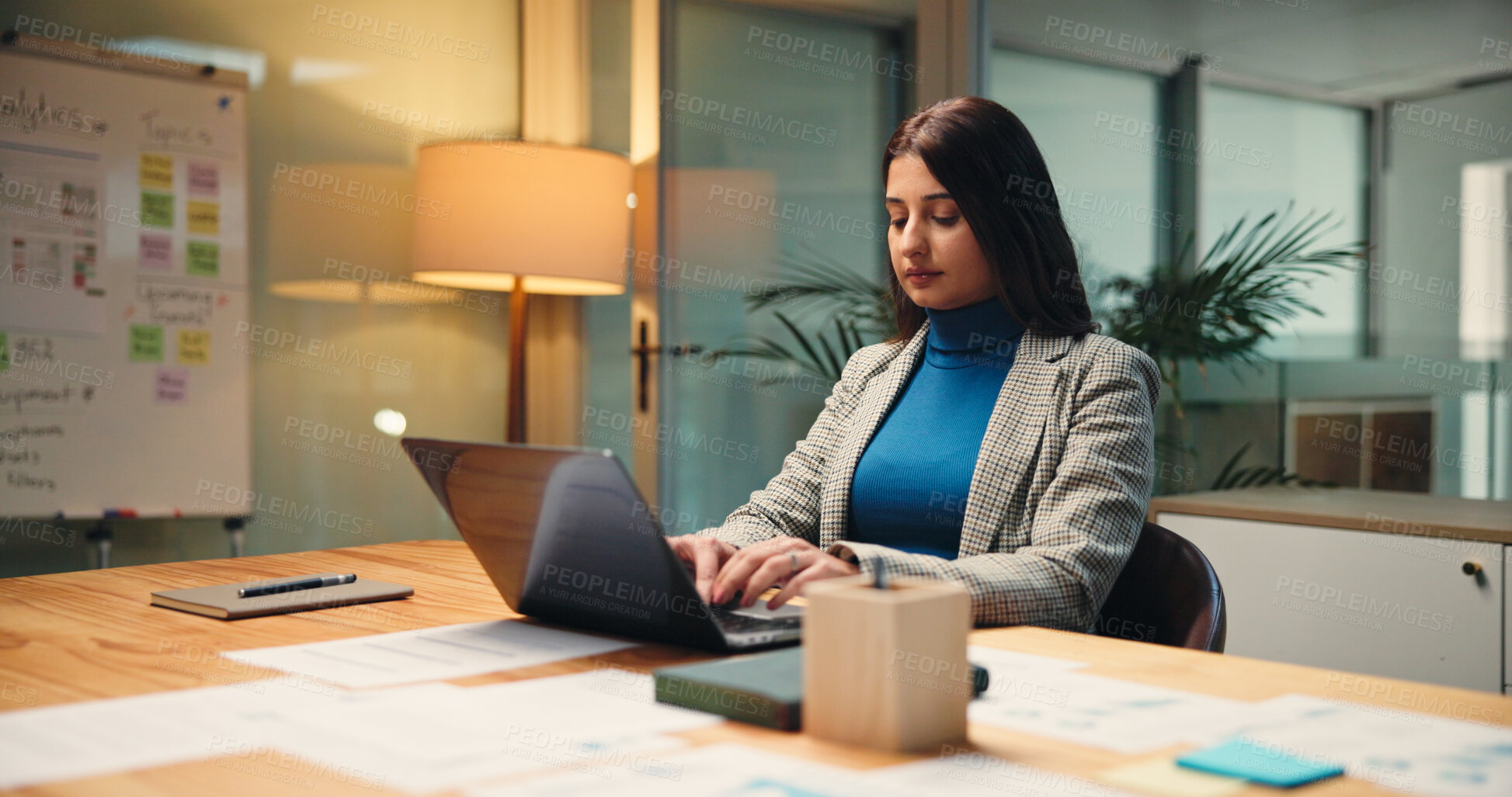 Buy stock photo Laptop, night and report with business woman in office for finance, investment or review deadline. Accounting, computer and financial feedback with Indian employee at desk in workplace for planning