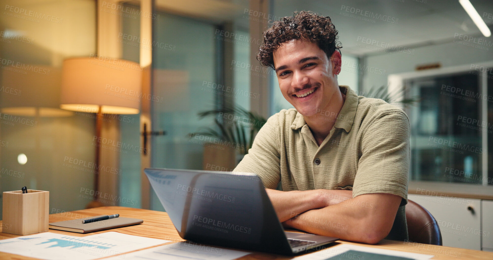 Buy stock photo Laptop, portrait and smile of business man in office at night for social media analytics. Arms crossed, computer and statistics with happy employee at workplace desk for evening deadline or research