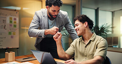 Buy stock photo Businessmen, night and laptop with fist bump for project deadline or success together in office. Male people, employees or analyst working late with touch, smile or computer for good job or well done