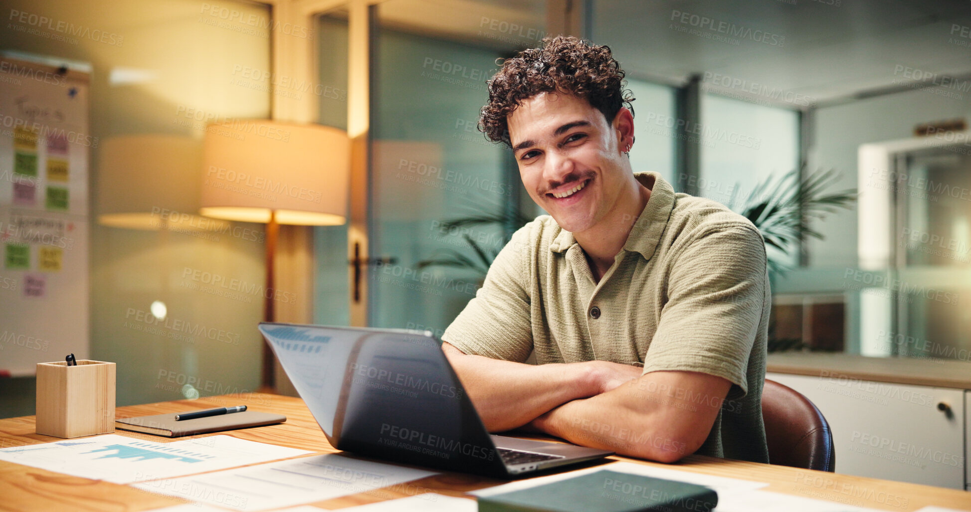 Buy stock photo Development, laptop and portrait of business man in office at night for social media analytics. Arms crossed, computer and statistics with smile of employee at desk in workplace for evening deadline