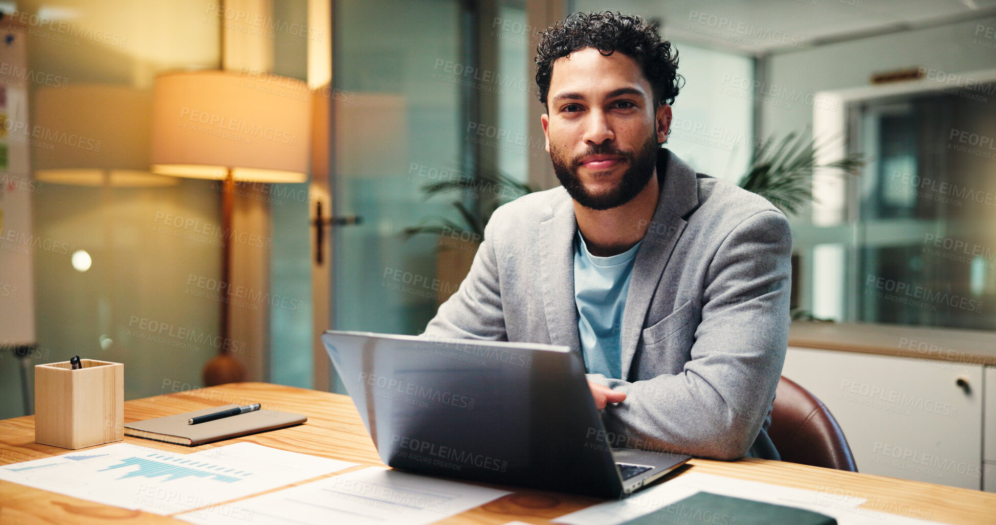 Buy stock photo Businessman, financial analyst or portrait with laptop at night for company report in office. Man, accountant or finance advisor working late with computer or documents for budget review in workplace