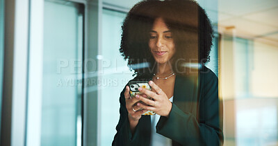 Buy stock photo Business woman, phone and typing in office with smile for communication, networking or social media post. Consultant, window and employee for conversation, texting or email for project management