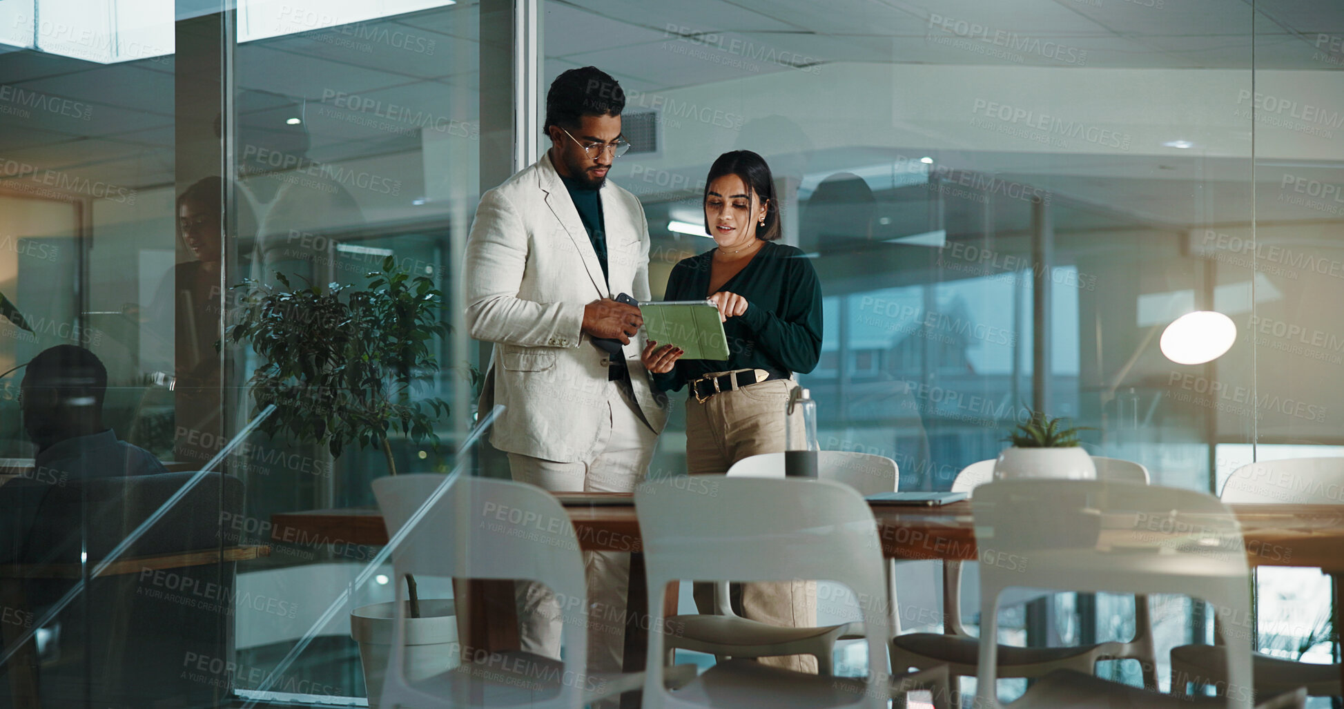 Buy stock photo People, meeting and tablet in office at night for accounting, financial planning and review budget. Staff, team and digital for finance report, company expenses and information on investment deadline