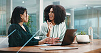 Breakthrough, ideas and laptop with business women in office together for conversation or planning. Computer, eureka and surprise with employee people at desk in workplace for project management