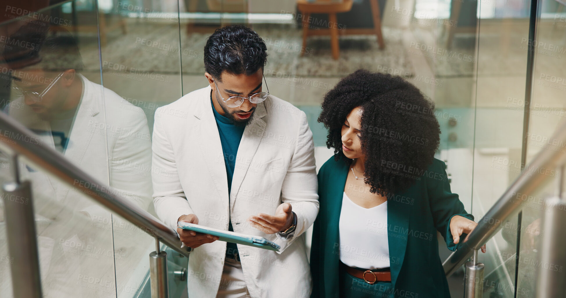 Buy stock photo Teamwork, stairs or business people with tablet for feedback, investment research or budget. Collaboration, walk or financial advisor in office lobby for news, accounting deadline or finance report