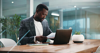 Buy stock photo Documents, laptop and business black man in office for finance report, budget review and investment. Professional, corporate and person with paperwork for financial planning, risk assessment or data
