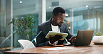 Laptop, tablet and black man in office with typing for finance report, planning or proposal. Research, digital technology and African male financial manager with computer for business investment.