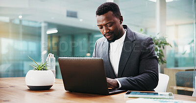 Buy stock photo Black man, typing and office with laptop for accounting, financial report or statistics. Male person, accountant or finance advisor working on computer or technology for project budget or review