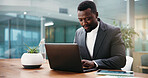 Laptop, research and black man in office with finance project for online client with investment proposal. Technology, typing and African financial manager with computer for budget report in workplace