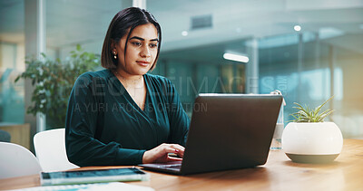 Buy stock photo Woman, laptop and night at office with finance review, problem solving or typing with profit report. Person, broker and click computer with overtime, feedback or revenue results at investment company