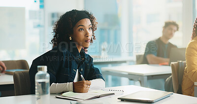 Buy stock photo Girl, writing and book in classroom at college, study and development with education, info or knowledge. Woman, university student and notes with project, learning and attention for scholarship