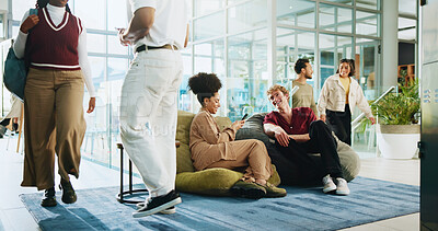 Buy stock photo People, students and friends with phone for university, schedule and chat on lobby beanbag. Man, woman and talk with mobile app, relax and social media post for college announcement or learning