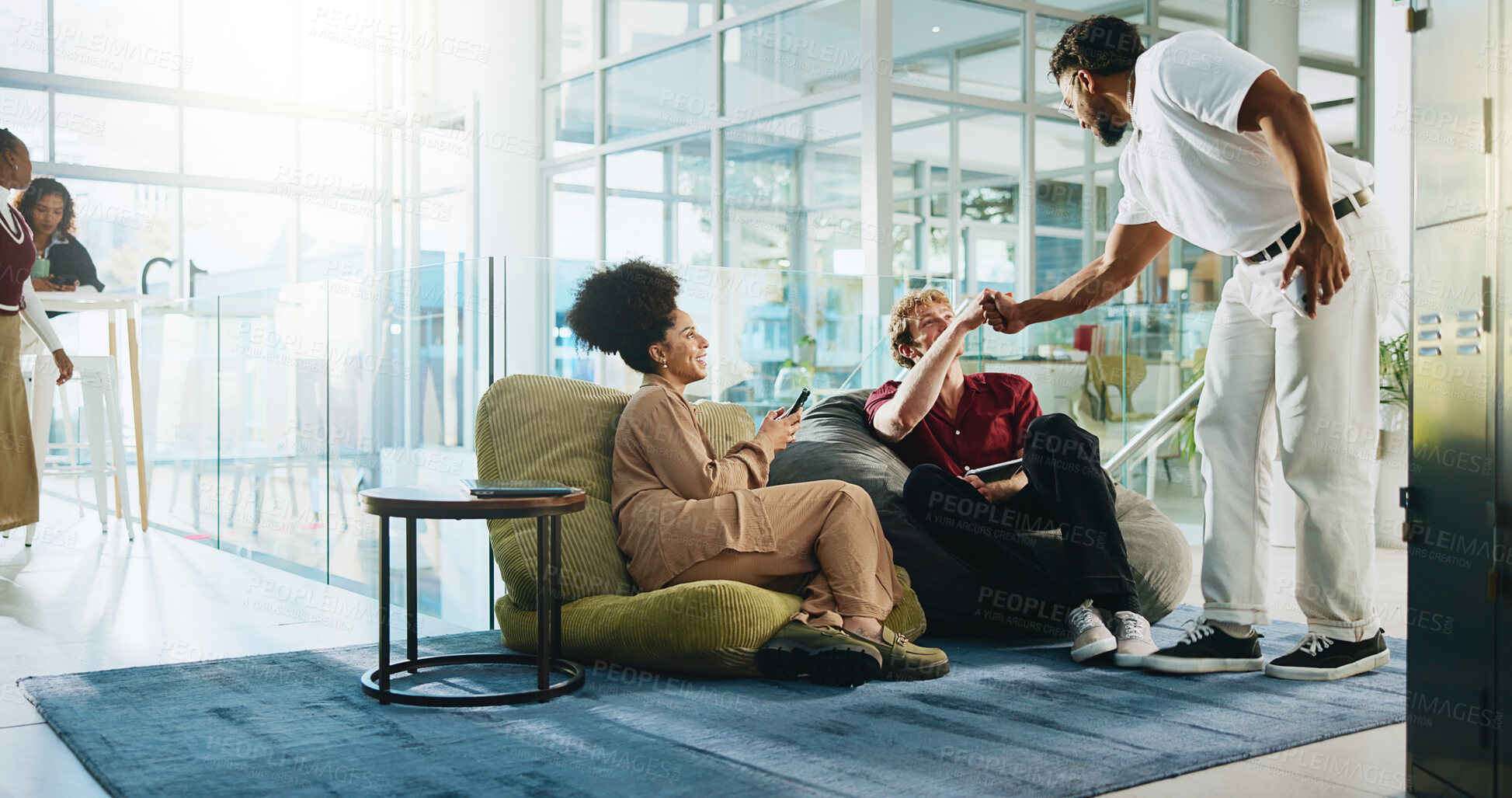 Buy stock photo Fist bump, meeting and students in college for greeting, study group and education support. University friends, scholarship success and thank you with people in campus lounge for exam achievement