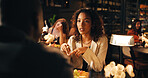 Conversation, date and food with couple in restaurant at night for bonding or celebration. Fine dining, romance and love with people at table together for anniversary, cuisine or relationship chat