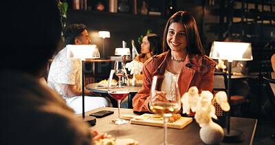 Buy stock photo Smile, date and relax with woman in restaurant for romantic anniversary, bonding and fine dining chat. Connection, love and marriage commitment with couple at night for dinner reservation and support