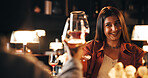 Woman, celebration and toast on date at restaurant with wine glass, cheers and bonding for relationship goals. Girl, couple and alcohol with smile, excited and romantic night with drinks at diner