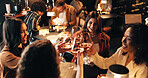 Happy women, friends and night with cheers in restaurant for celebration, toast or get together. Female people, group or evening out with wine glasses or alcohol for social gathering or event in cafe