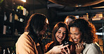 Phone, laughing and reading with friends in restaurant for nightlife, social media meme and communication app. Happiness, bonding and online comedy with group of women and mobile for contact