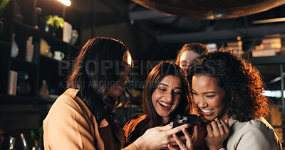 Buy stock photo Phone, laughing and reading with friends in restaurant for nightlife, social media meme and communication app. Happiness, bonding and online comedy with group of women and mobile for contact