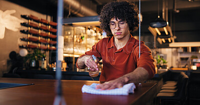 Buy stock photo Cleaning, waiter and man with chemical, bar and spray for hygiene, routine and sanitation for germs. Small business, disinfection and person with liquid for dirt, cloth and maintenance at night cafe